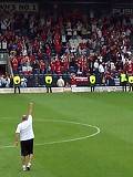 Walsall manager Richard Money shows his delight in front of the Walsall fans