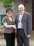 Motorstore manager Shirley Thorp & Hospice fundraising manager Ian Jenkins