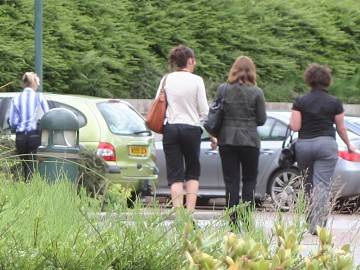 Staff make their way to their cars having been told of the job losses