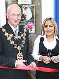 Cutting the ribbon: Rochdale Mayor, Councillor Peter Evans with 'Ashi's' owner Asma Akhtar