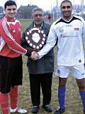 Lee Murphy captain of the Rochdale Council Team, Cllr Sharif holding the Unity Shield and Azmat Khan captain of the Faith Team