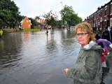 West Heywood Councillor Jacqui Beswick surveys the flooding