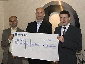 Adil Ansari and Colin Crabtree of Keystone Properties hand a cheque to RDSFL Chairman Jim Matthews