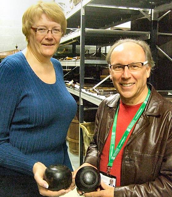 Councillors Irene Davidson and Keith Swift get a grip of John Bright's bowls at the Rochdale Link4life Arts and Heritage Service.