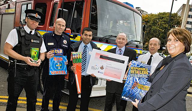 Responsible retail: Inspector Troisi of Greater Manchester Police, Colin Moran of Greater Manchester Fire and Rescue service, Councillor Ibrar Khan and Ted Flynn, Andy Collinson of Greater Manchester Fire and Rescue service and Michaela Monk of Rochdale  Council’s Trading standards.