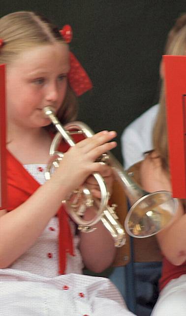 Rebecca Howard playing her cornet at Queens Park concert.