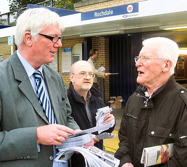 Paul Rowen discusses the bid with John Rodgers and local resident Ken Feven at Rochdale train station earlier this week.