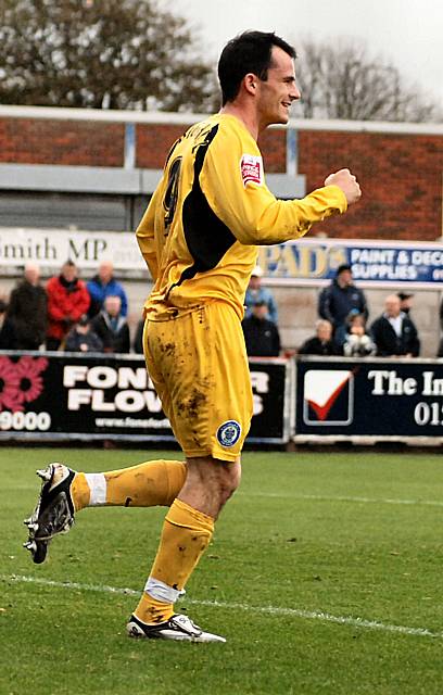 Dagnall celebrates his goal.