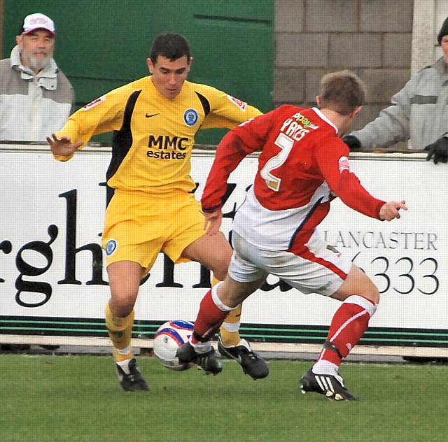 Adam Yates tackles Adam Rundle.