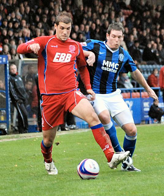 Ciaran Toner tries to get in a tackle.