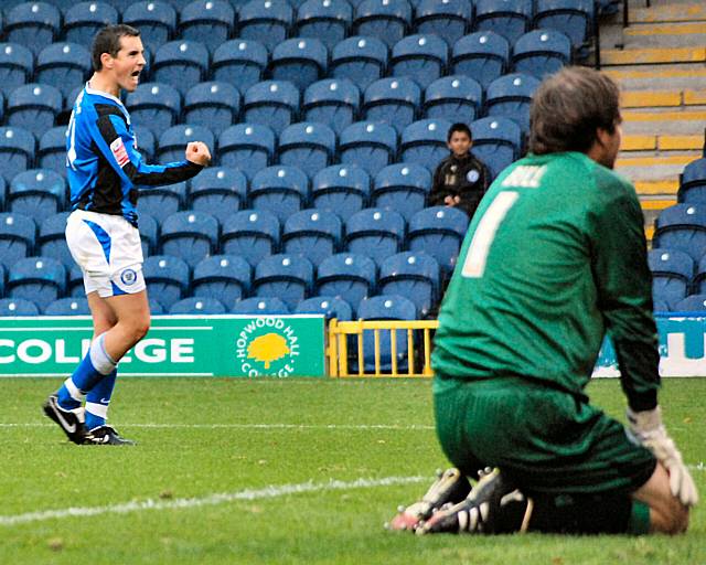 Rundle's celebration continues as Nikki Bull rues the deflected shot.