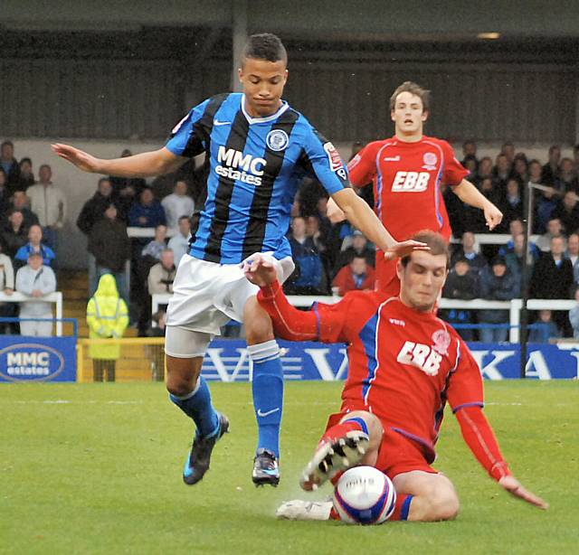 Joe Thompson is tackled.