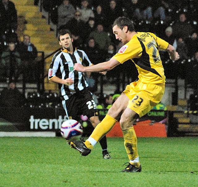 Rory McArdle makes a clearance.