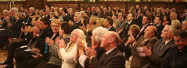 Guests applaud as the Freedom of the Borough is officially granted to Rochdale Football Club.