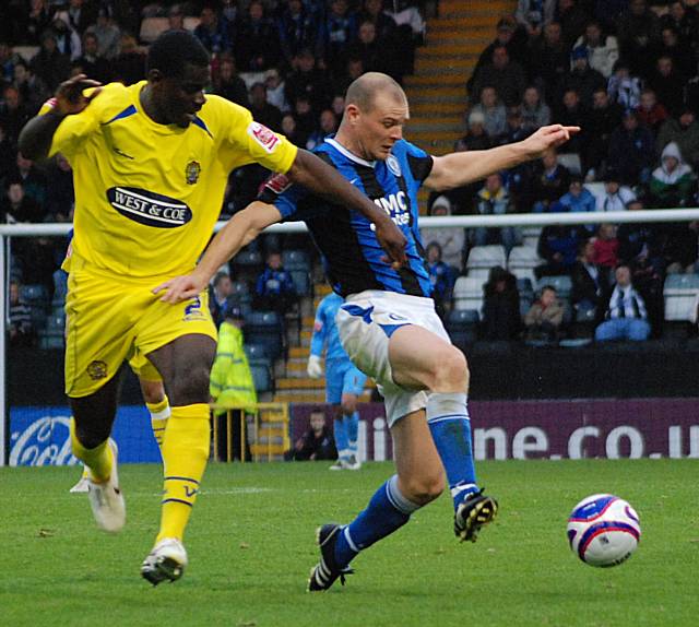 Jones and Magnus Okuunghae lock horns.