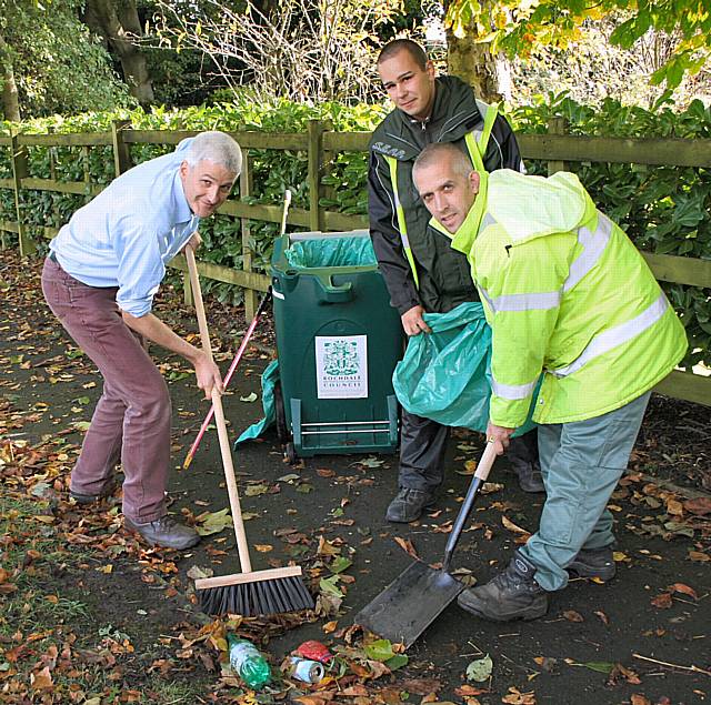 Councillor William Hobhouse, chairman of Rochdale Township, joins street cleaners on patrol in Bamford.