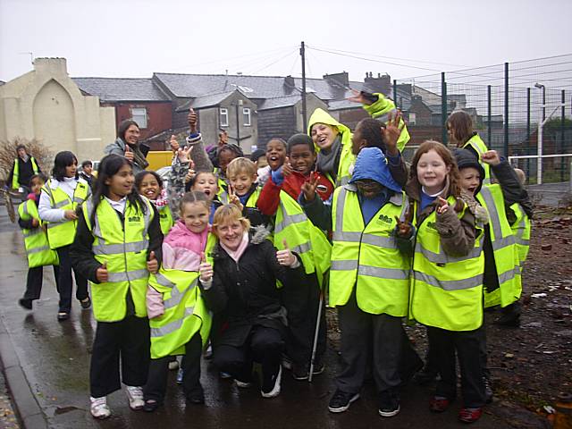 Pupils from St John Primary School with Groundwork staff on the clean up on Ann Street.