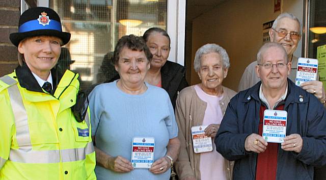 Local residents of Thistleyfields show their support for the ‘No Cold Calling’ zone set up in their neighbourhood, with Police Community Support Officer, Angela Smith and Councillor Christine Akram (back left).