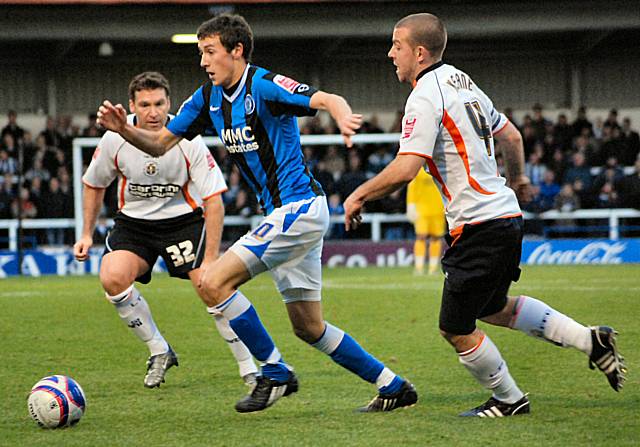 Will Buckley attacks the Luton defence.