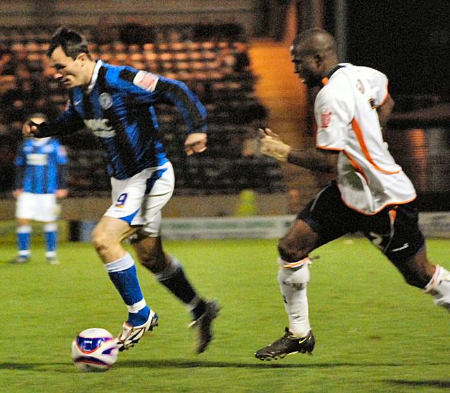 Chris Dagnall shows Gnakpa a clean pair of heels.