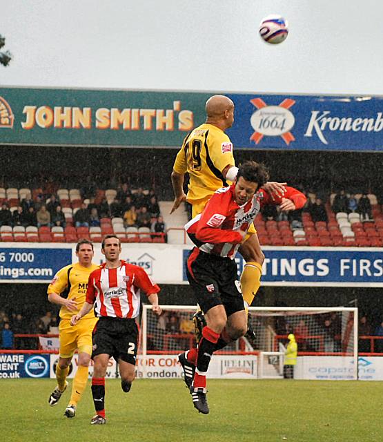 Lee Thorpe wins a header.