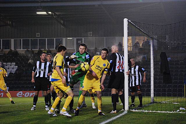 The keeper has another dodgy moment from a Dale corner.