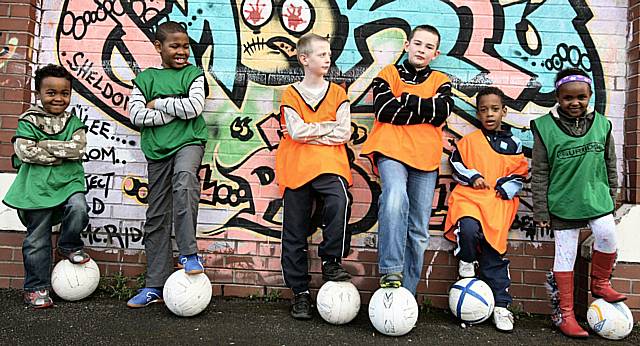 Picked for the team- kids from Langley kicking racism out at the football skills session organised by Bowlee Park Housing.