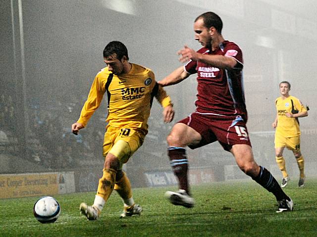 Adam Le Fondre holds up the ball.