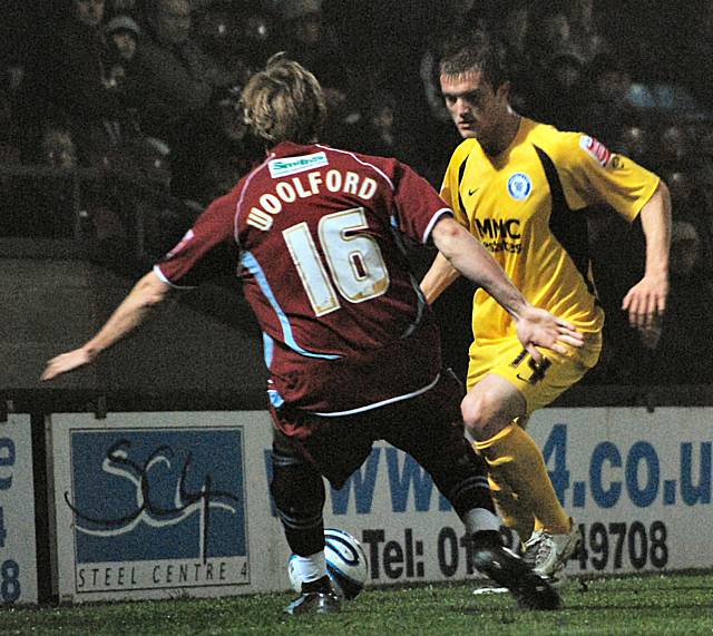 Scott Wiseman looks to get beyond Martyn Woolford.