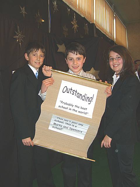 Louis Lisle (centre), with ‘Ofsted Inspectors’ Callum Knox and Hope Bleasdale - stars in the annual nativity play at Whittaker Moss Primary School.