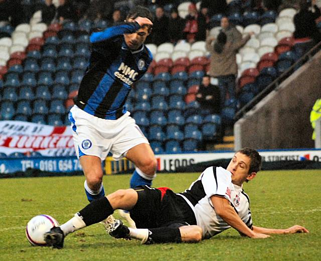 Le Fondre looks to turn Cooper in the box.