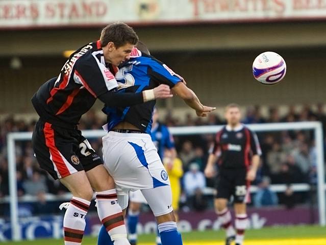 Shane Cansdell-Sheriff rises for a header with Joe Thompson (Rochdale v Shrewsbury 26-12-08)