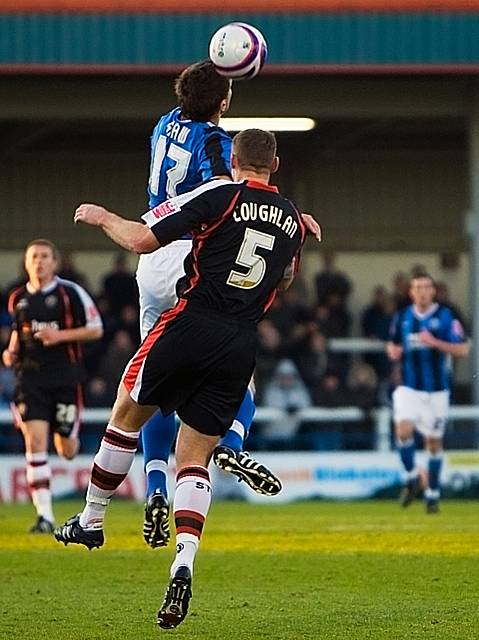 Shaw wins a header under pressure from Graham Coughlan (Rochdale v Shrewsbury 26-12-08)