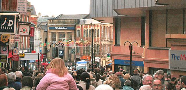 Crowds head down Yorkshire Street after the street and nearby shops were evacuated this morning.