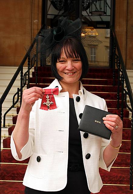 Val Finnegan shows her MBE