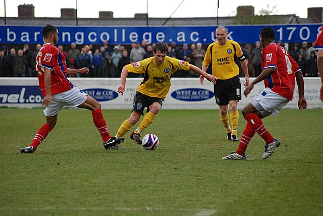 Tom Kennedy takes on the Dagenham defence