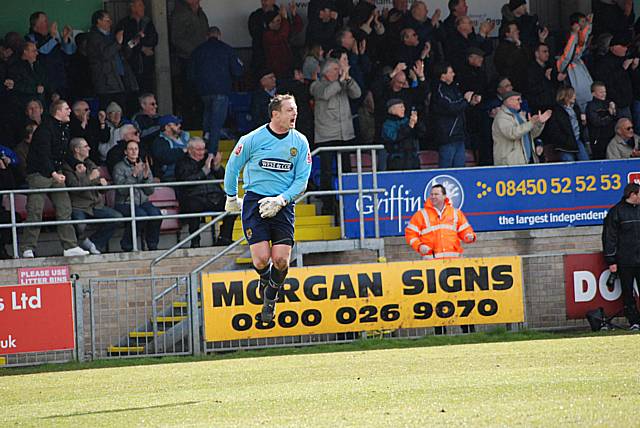 Dagenham goalkeeper Tony Roberts celebrates his side's equaliser