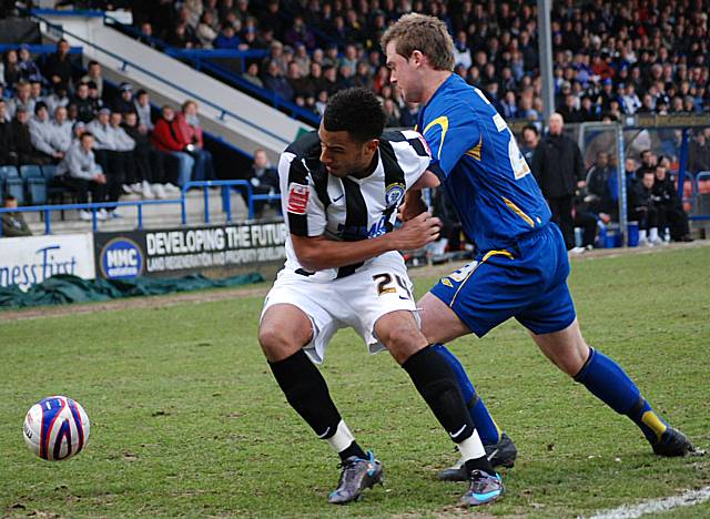 Howe tussles with McStay in a fight for the ball