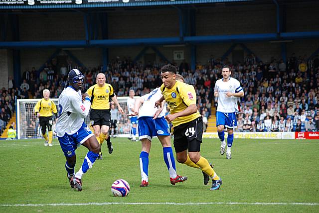 Howe skips past Ben Futcher and looks to take on Sodje