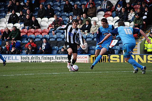 Tricky: Adam Rundle shapes to shoot after cutting inside a defender