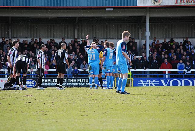 Marching orders: The referee sends off Grimsby's Nathan Jarman