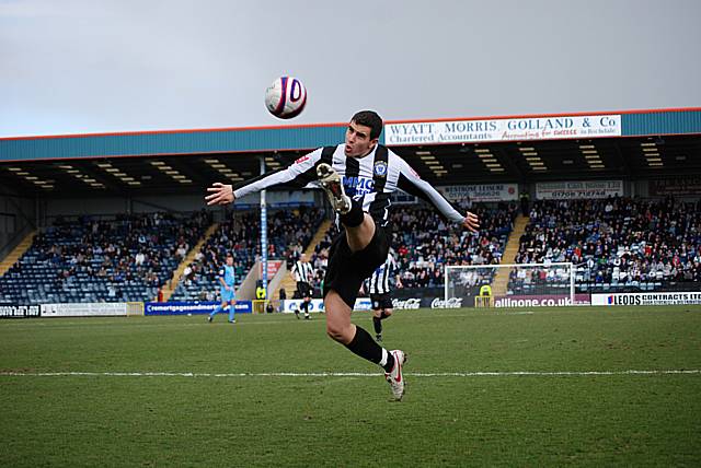 Close control: Rundle plucks the ball out of the air