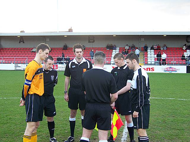 The coin toss with team captains Simon Riley (Plough) and Ste Greenwood (Lostock)