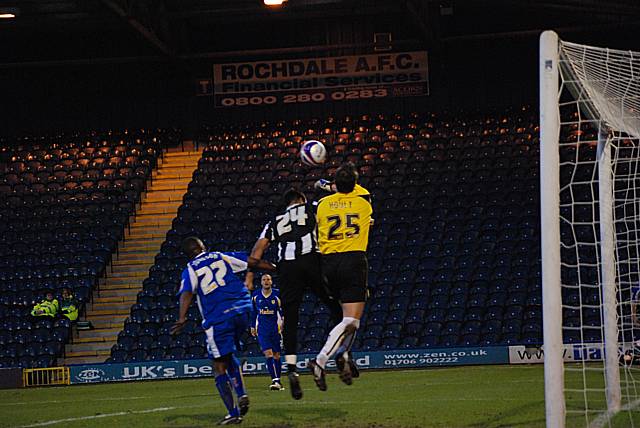 Rene Howe goes up for a cross with Notts' keeper Russell Hoult