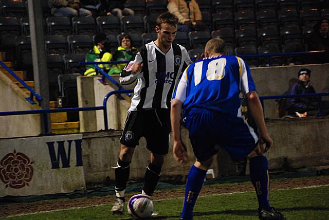 Kallum Higginbotham takes on Stephen Hunt