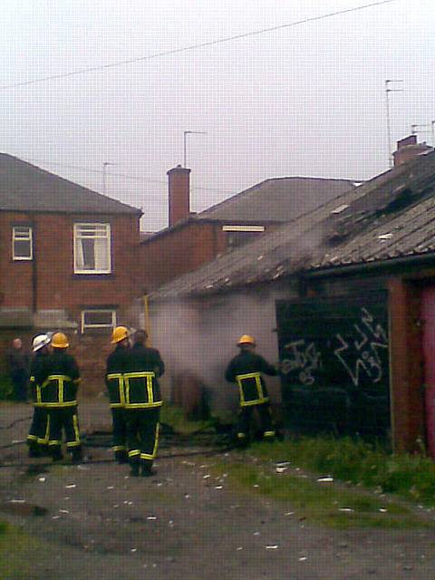 Rochdale Fire Brigade deal with fire at garages behind Woodstock Street 