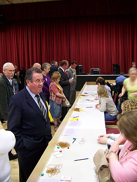 Lib Dem councillor Peter Rush looks on as the North Heywood count begins to favour the Lib Dems