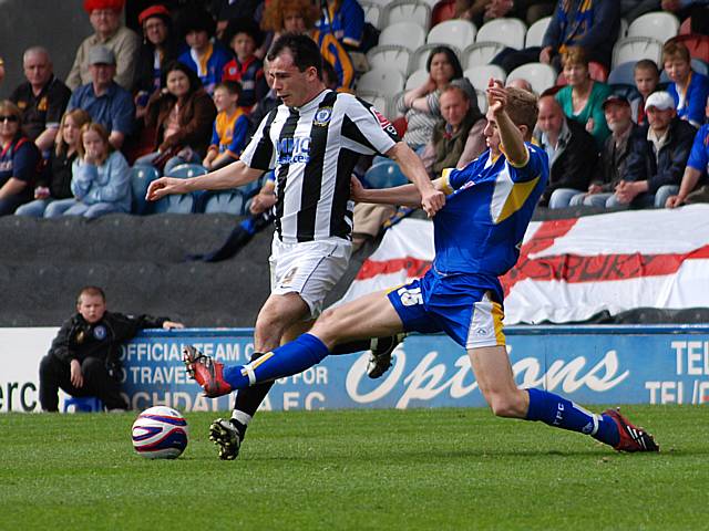 Chris Dagnall evades a tackle