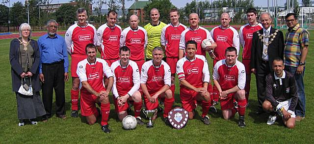 Rochdale police team with guests and the Alliance Trophy