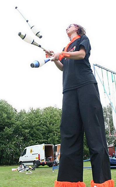 Skylight's Simon Hills does some club juggling on stilts